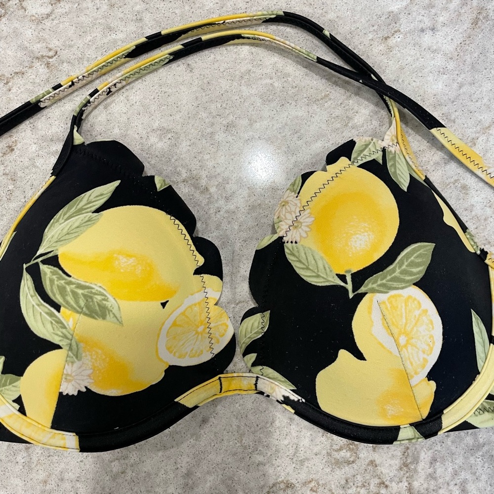 Black swimsuit top with lemons